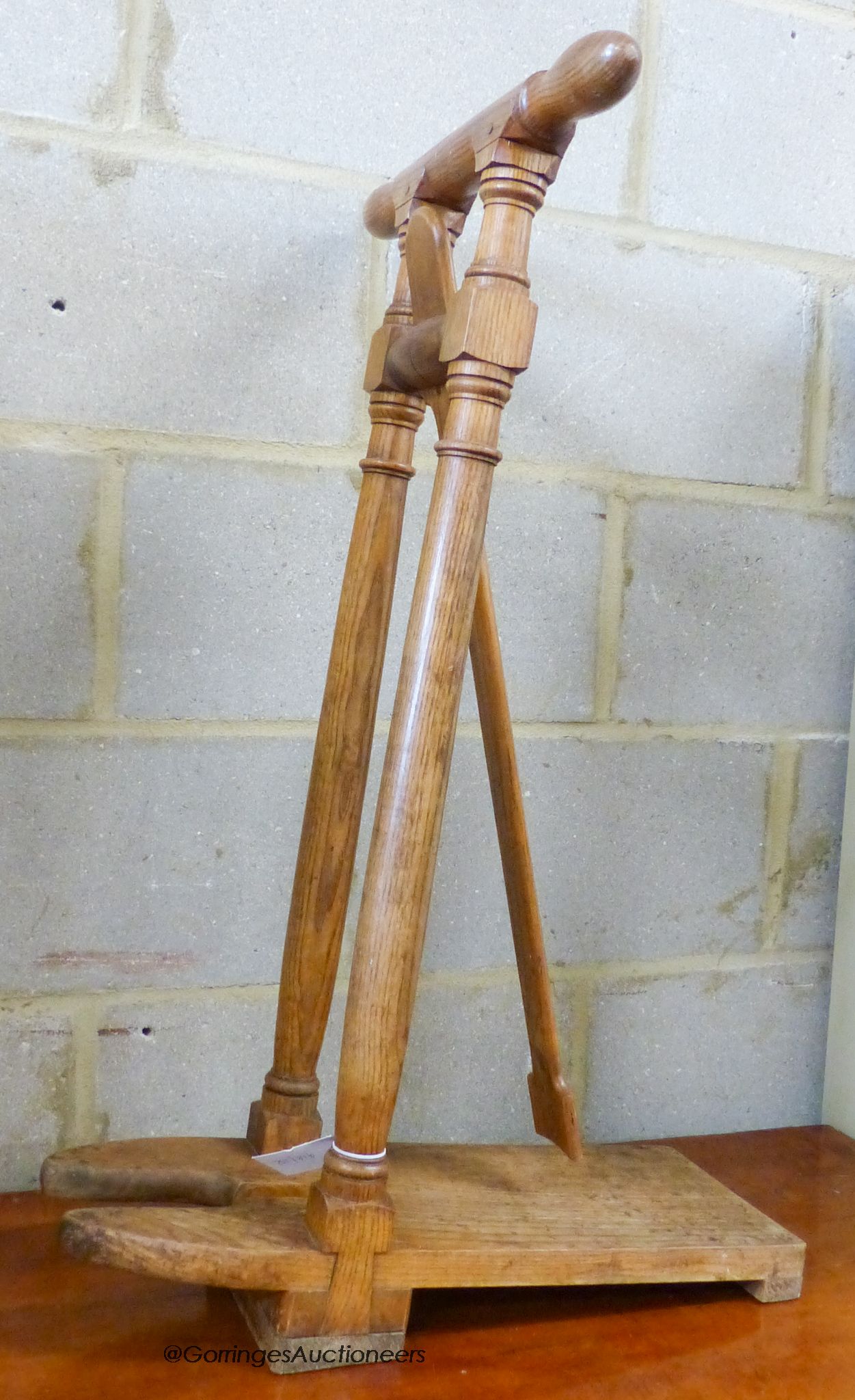 A Victorian oak boot jack, width 52cm, height 82cm